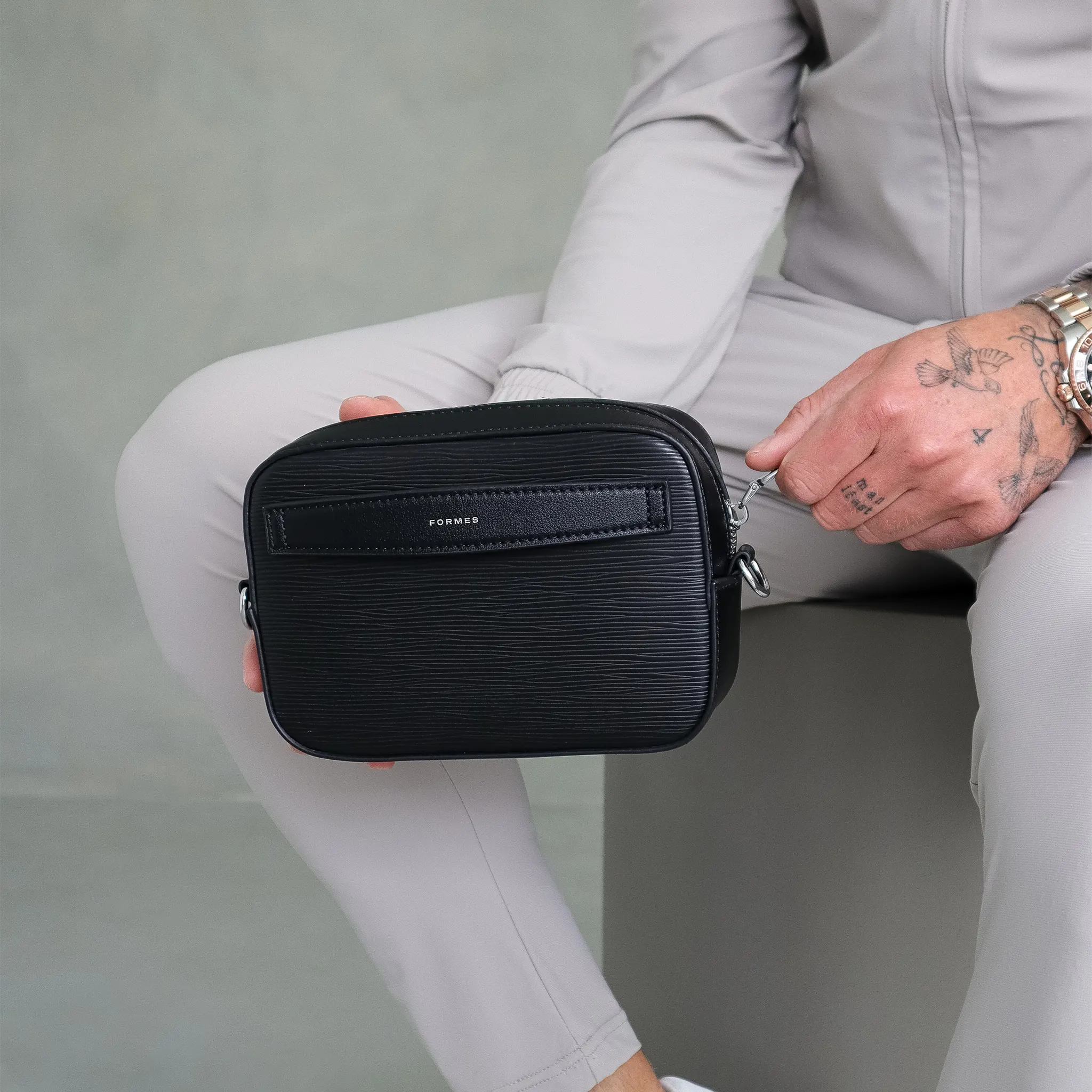 Model View of Formes Adapt Ripple Nero Mini Crossbody Bag